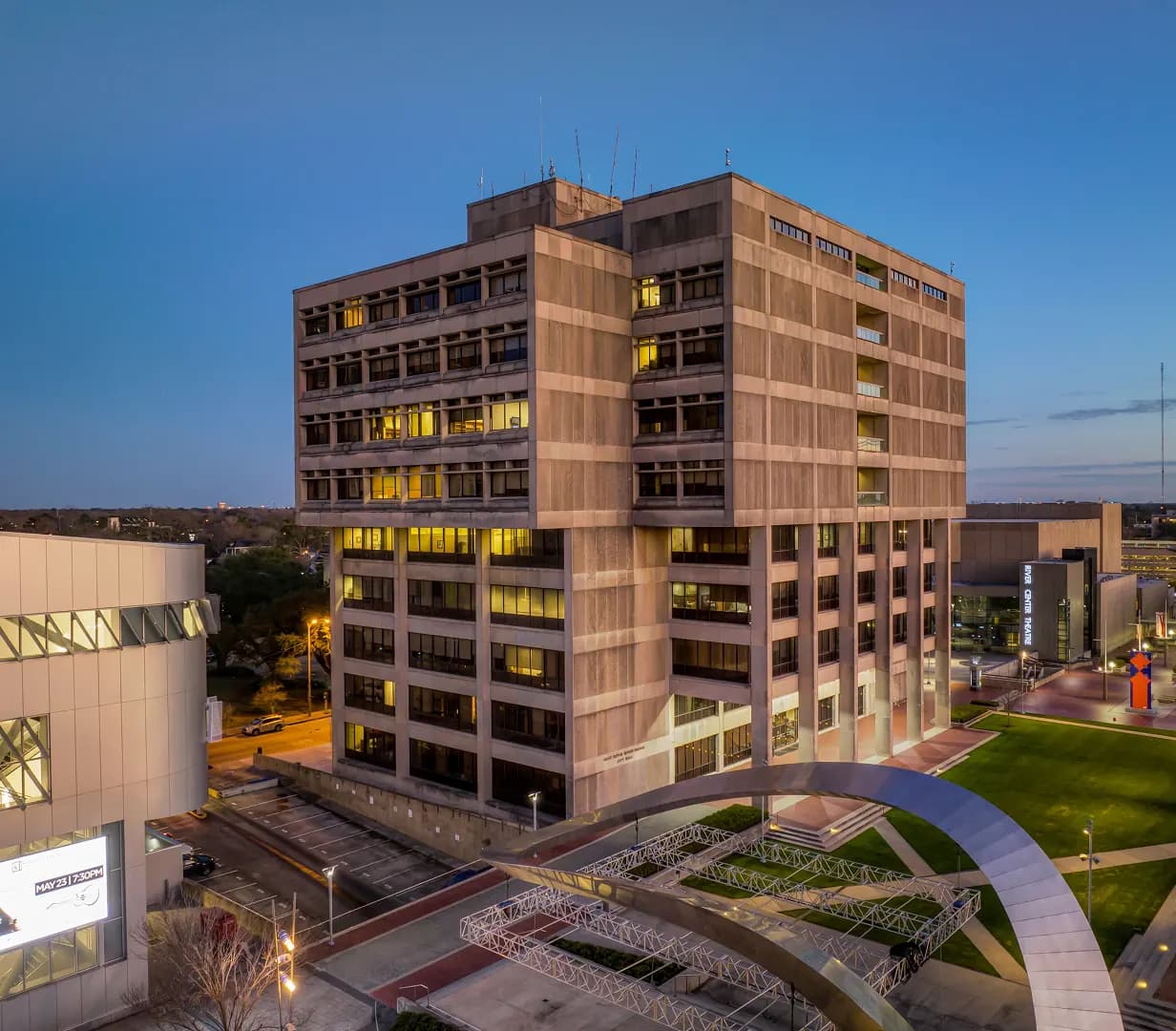 Raising Cane's River Center at dusk in downtown Baton Rouge, Louisiana, a charter bus convention destination