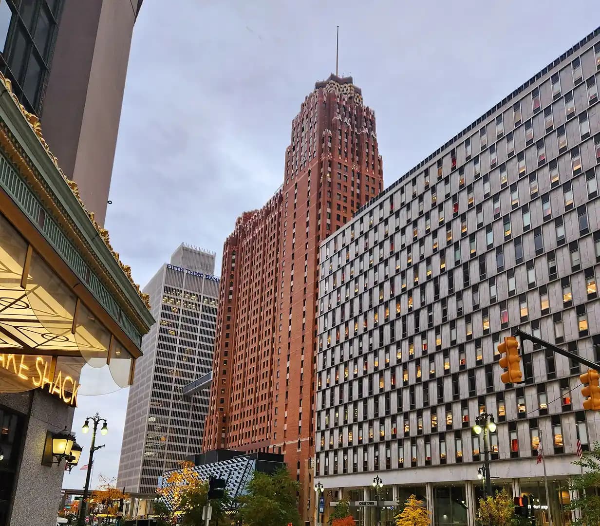 Street-level view of the Art Deco Guardian Building in downtown Detroit's financial district