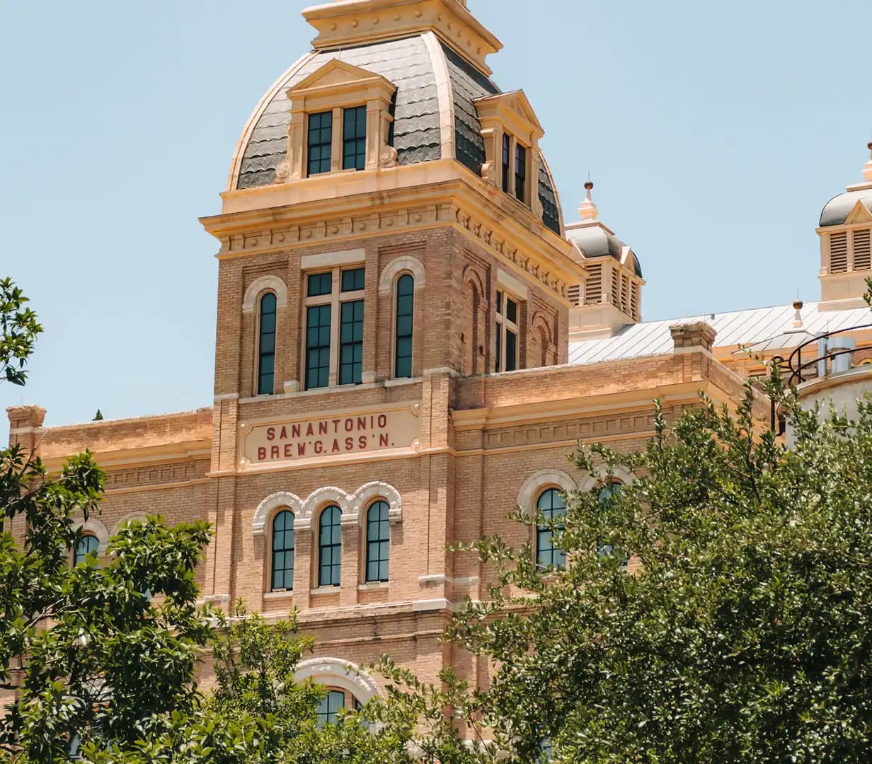 Historic San Antonio Brewing Association building with its distinctive dome at the Pearl in San Antonio, Texas, a charter bus tour stop
