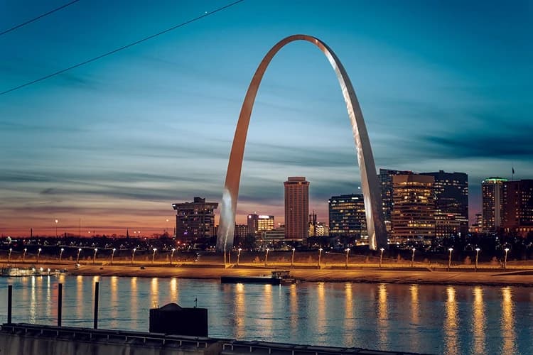 Gateway Arch above the Mississippi River at twilight in St. Louis, Missouri, a common pickup area for charter bus groups