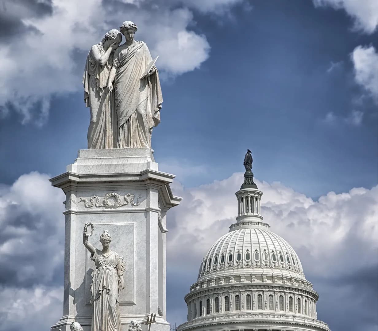 The Peace Monument with the US Capitol dome behind it on Capitol Hill
