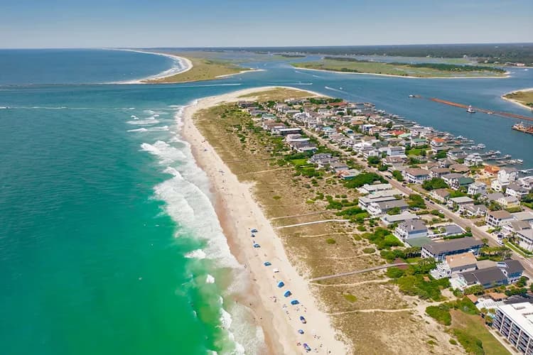 Turquoise ocean along a barrier island beach near Wilmington, North Carolina, where charter bus wedding shuttles run