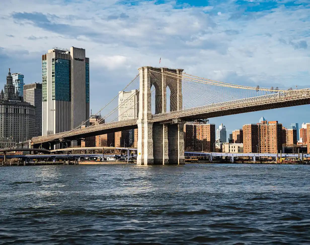 Charter bus rental New York Brooklyn bridge waterfront.