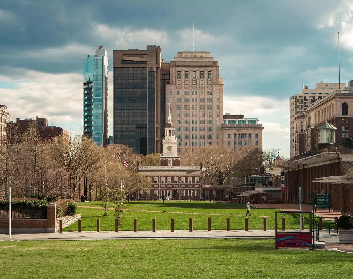 Charter bus rental Philadelphia Independence Hall skyline.
