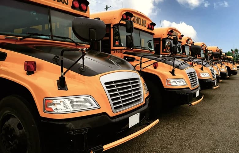 Yellow school bus rental fleet.
