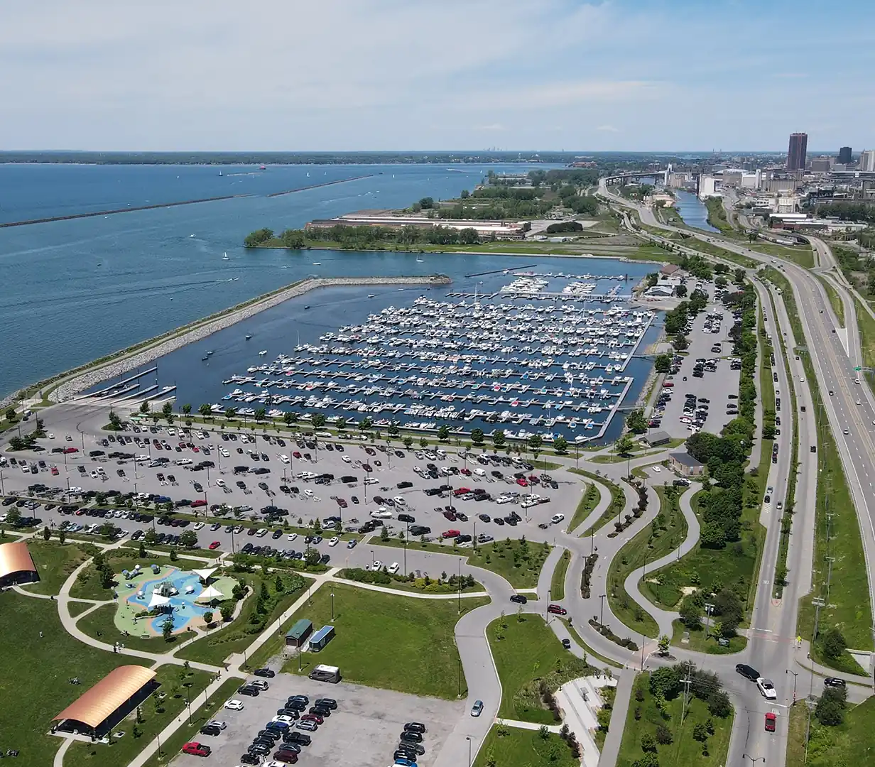 Aerial view of the Erie Basin Marina and Lake Erie waterfront in Buffalo, New York, near the Canalside charter bus drop-off area
