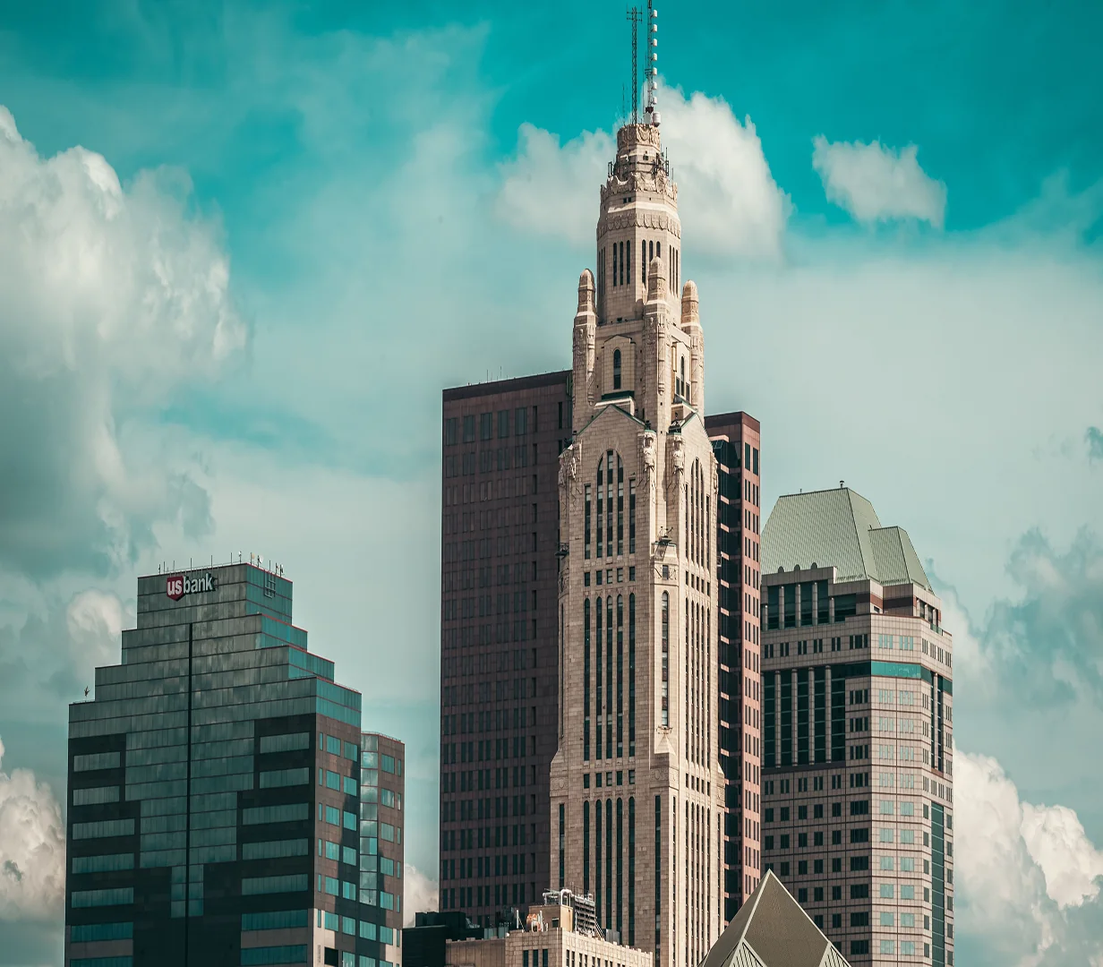 Art Deco LeVeque Tower rising over downtown Columbus, Ohio, on the streets charter bus operators run daily