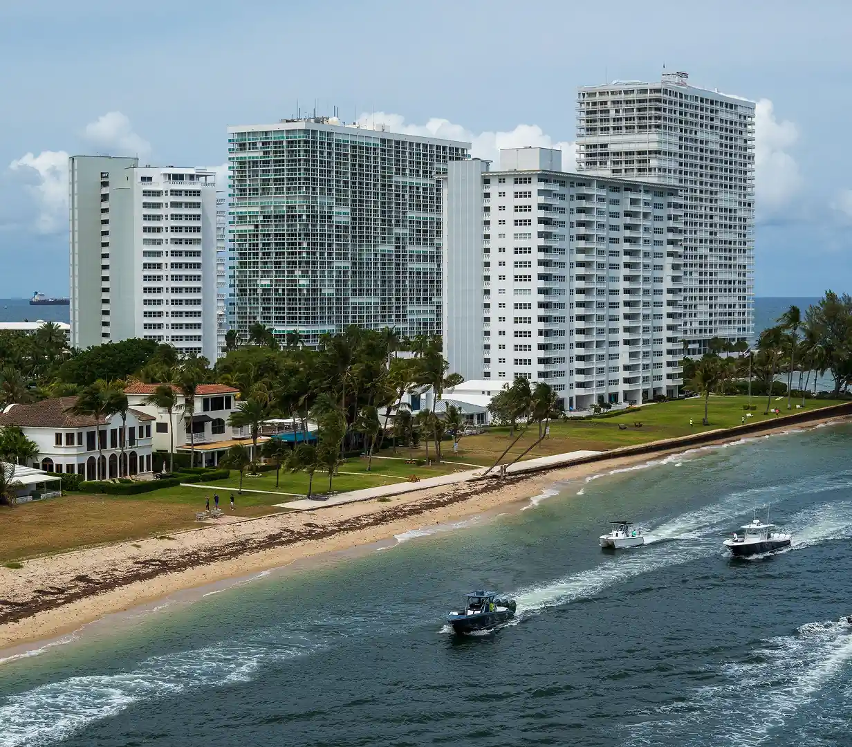 Aerial view of beachfront condos, boats, and the ocean along A1A in Fort Lauderdale, Florida, a beach-wedding destination for charter bus groups