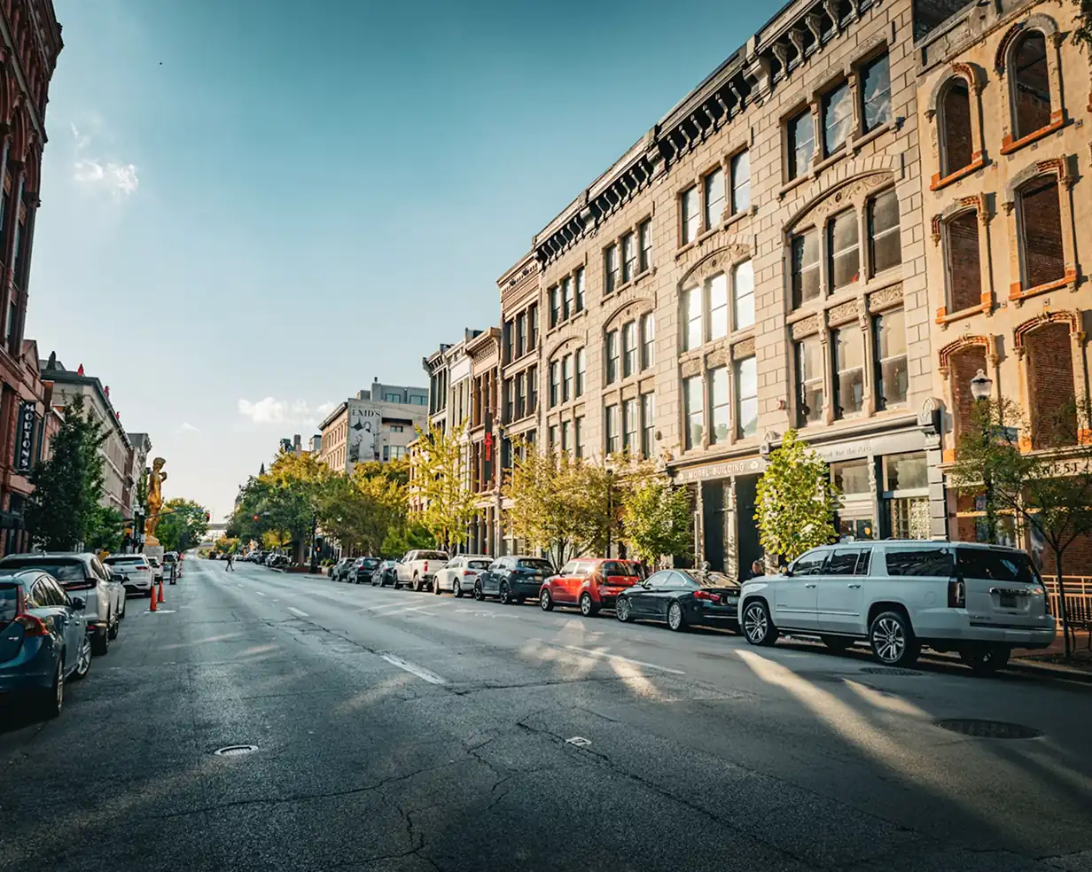 Victorian cast-iron storefronts on historic Main Street in downtown Louisville, Kentucky, where charter bus groups start a Whiskey Row day