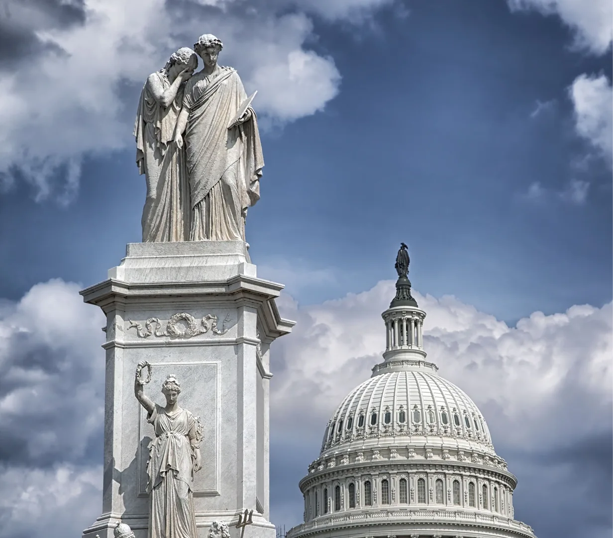 The Peace Monument with the US Capitol dome behind it on Capitol Hill