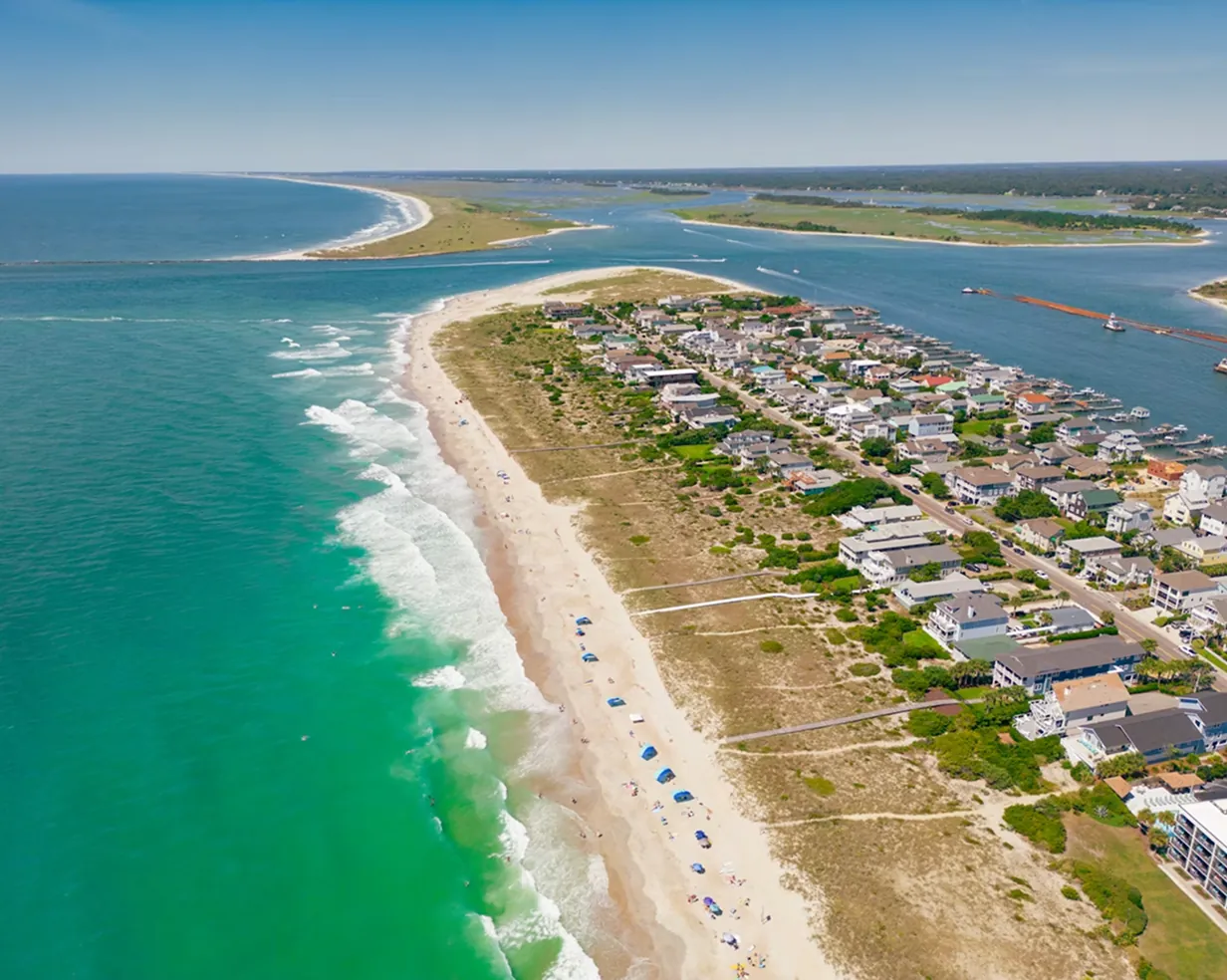 Turquoise ocean along a barrier island beach near Wilmington, North Carolina, where charter bus wedding shuttles run