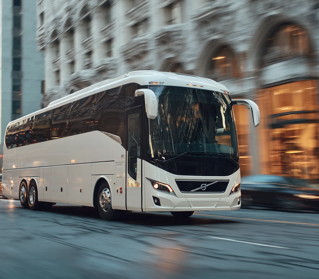 Coach on city street.
