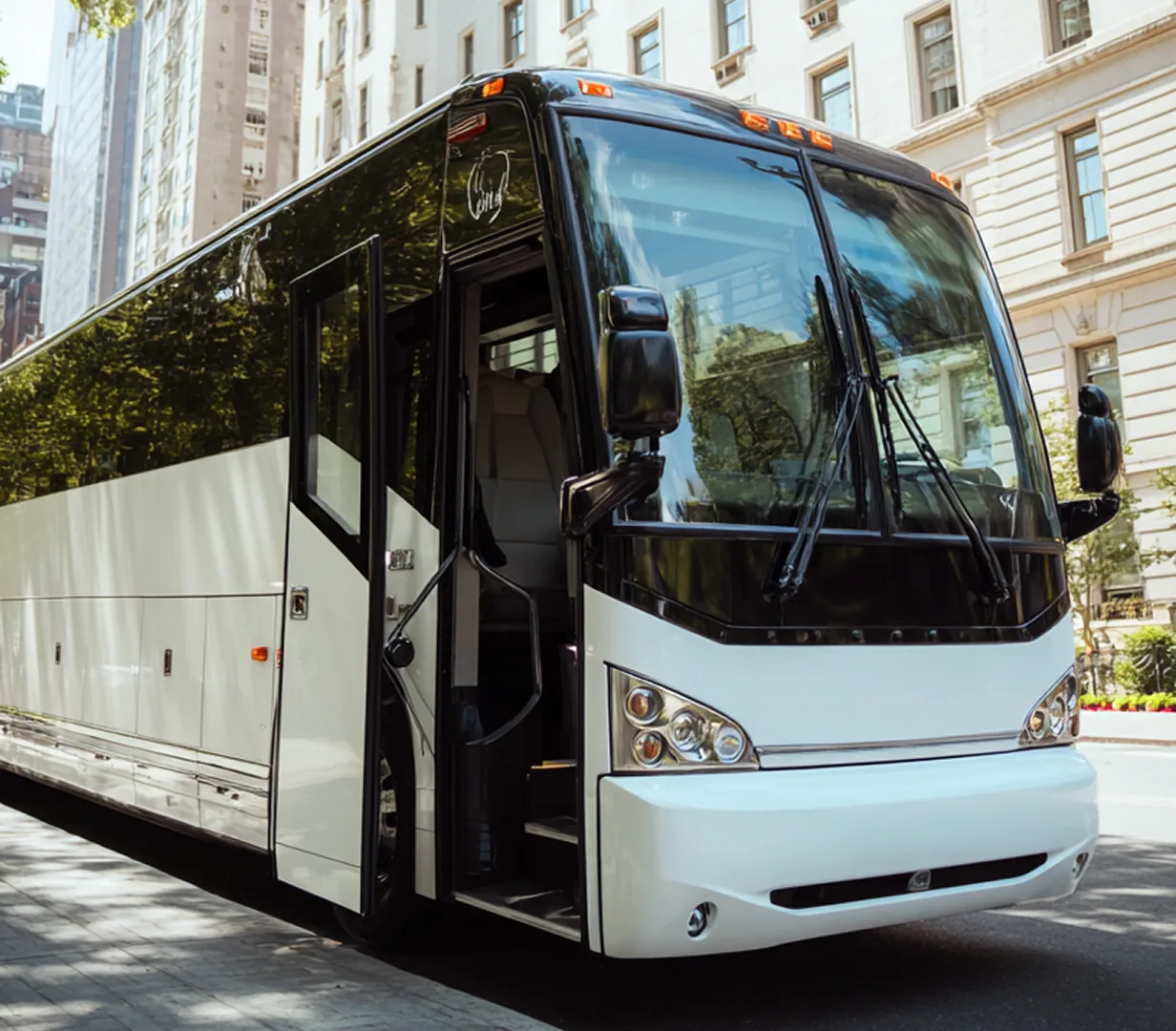Coach parked on city street.