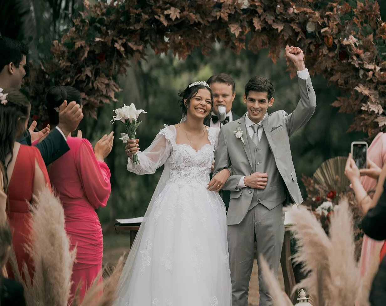 Wedding charter bus transportation at outdoor ceremony.